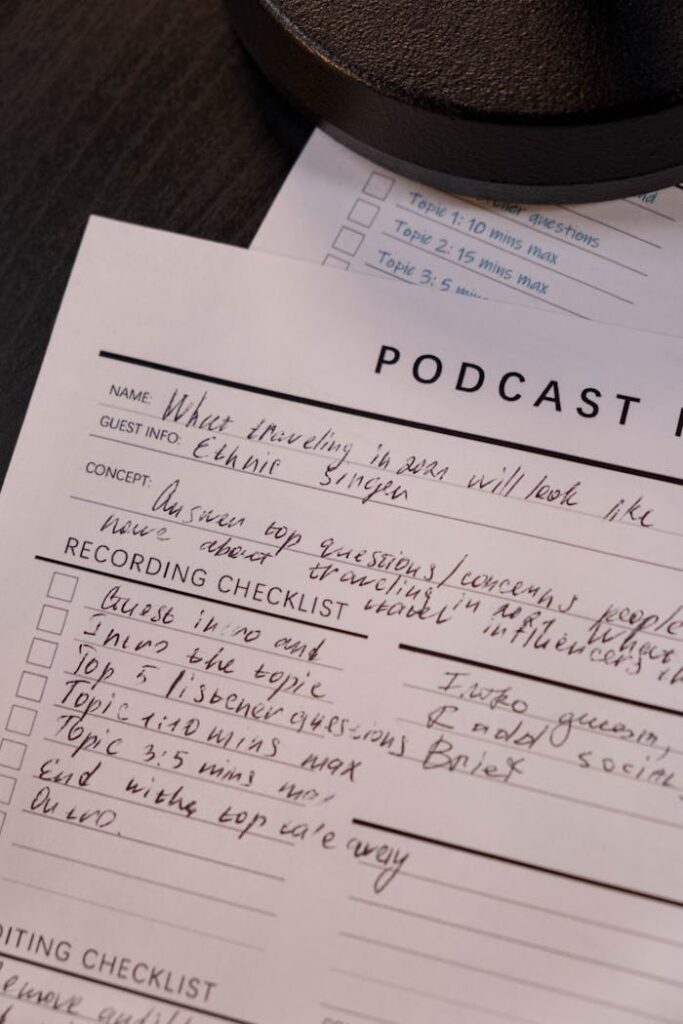 pexels-photo-6878176 Detailed podcast planning sheet with handwritten notes for effective recording.